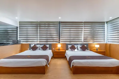 Familiekamer met tuinzicht — Thanh Long Hotel - Apartment